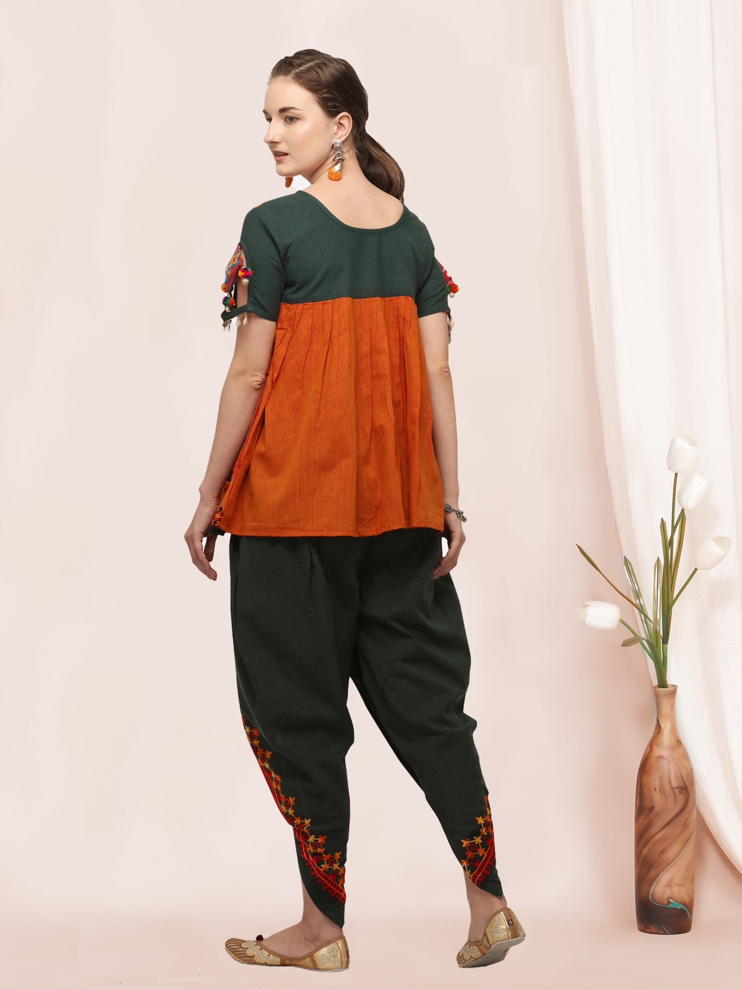 Deep green and orange rajathani dhingli couple embroidered kedia and tulip pants set